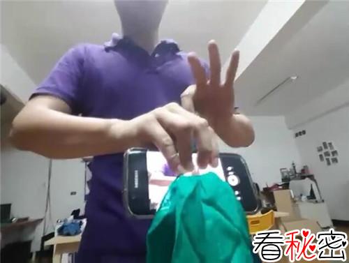视频：丝巾穿越手机屏幕从背面拉出 你能看出破绽吗